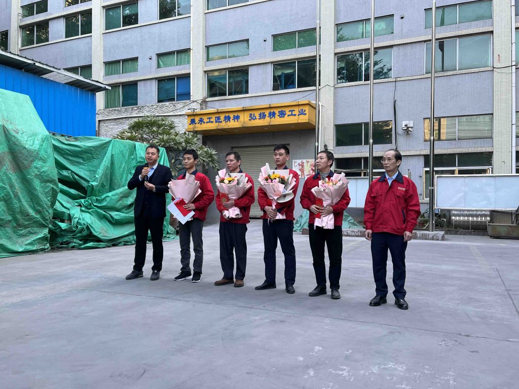 TYPT Company held the national flag raising ceremony and the staff 10th anniversary commendation conference